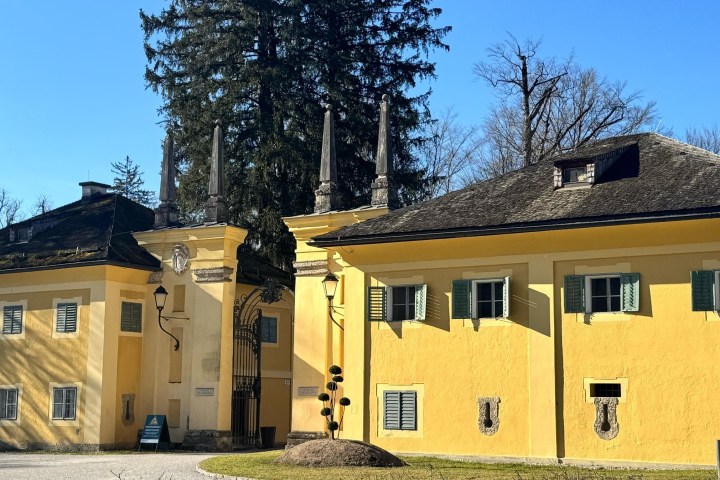a house that is parked on the side of a building