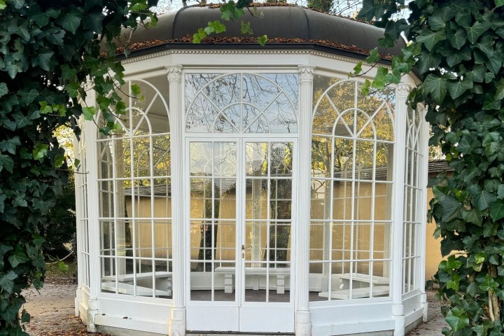 a chair sitting in front of a window