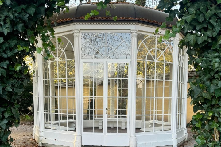 a chair sitting in front of a window