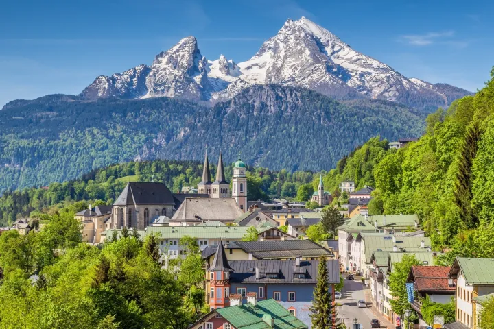 a castle with a mountain in the background