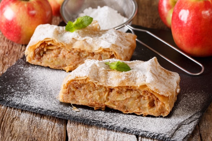 a piece of bread on a wooden table