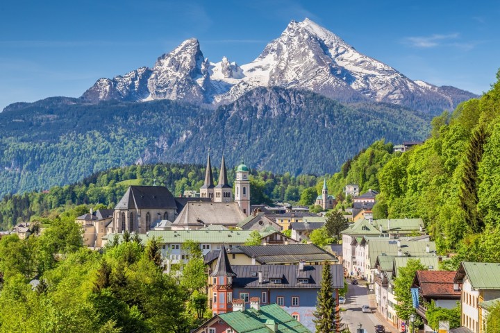 a building with a mountain in the background