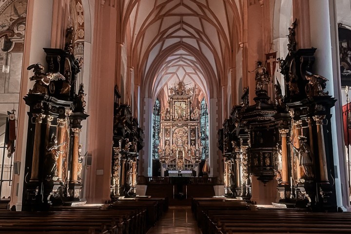 a chair sitting in front of a building