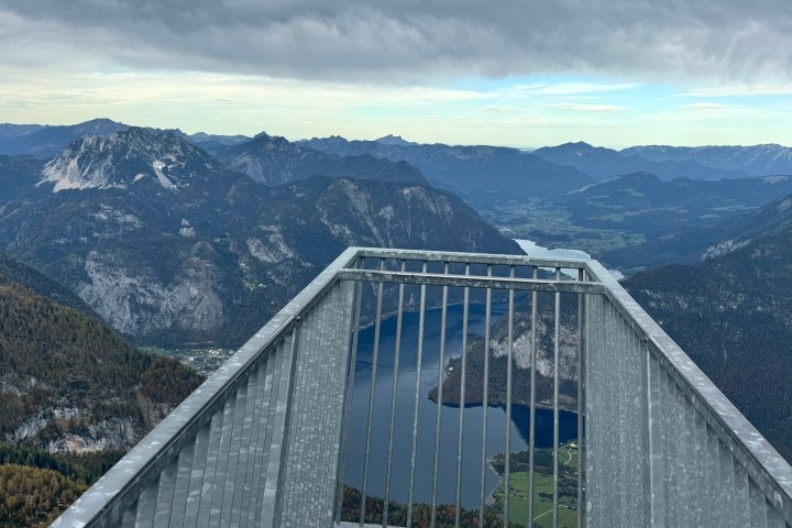 a bridge with a mountain in the background