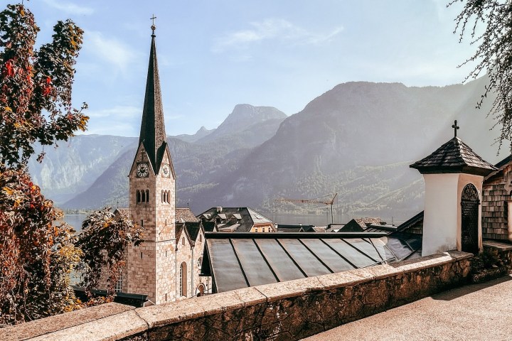 a building with a mountain in the background