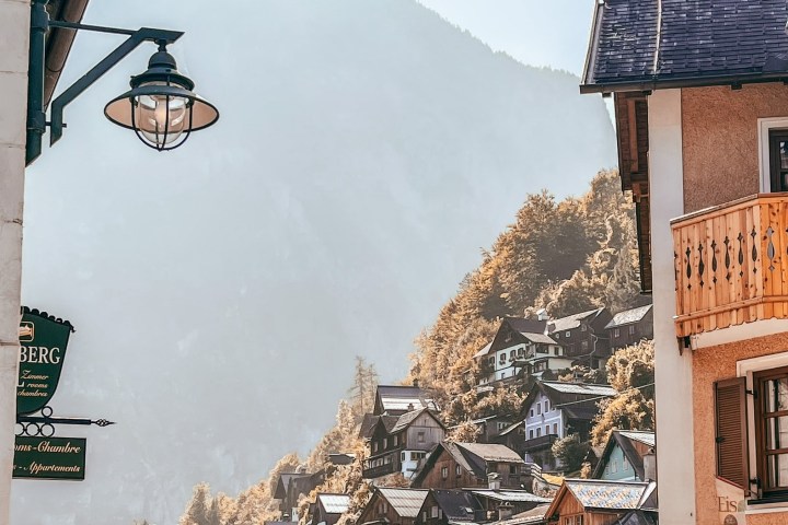 a building with a mountain in the background