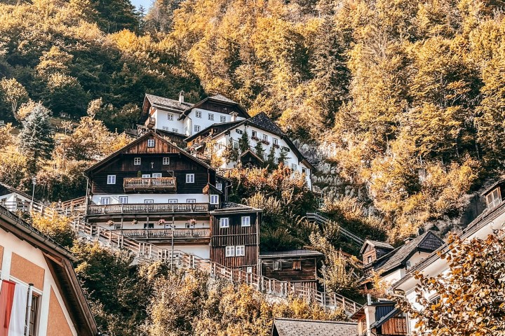 a train on a track near a building