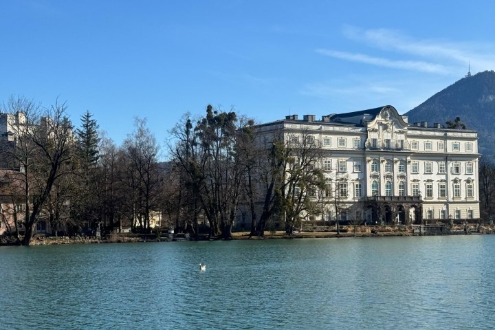 a large body of water in front of a building