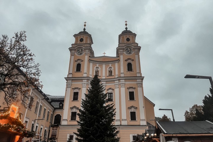 a group of people in front of a church