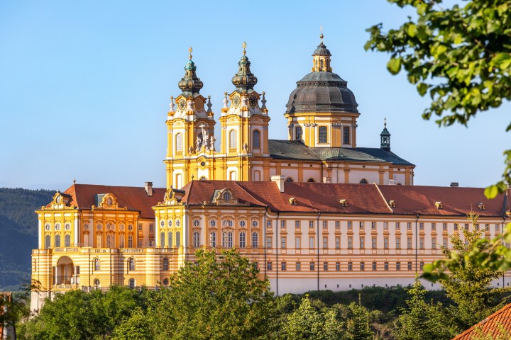 a large clock tower towering over a city