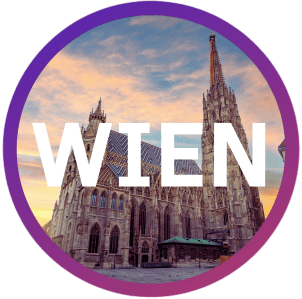 Gothic cathedral with sunset sky, circular frame, and 'WIEN' text overlay.