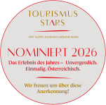 Tourismus Stars nominee badge for 'Erlebnis des Jahres 2026' in red and gold text.